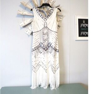 Elegant Gold Sequin Midi Dress with Fringe